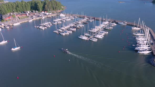 The Speedy Boat Going Near the Docking Area in Baltic Sea in Finland