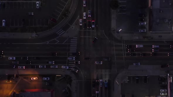 AERIAL: Birds Eye View of Culver City, Los Angeles, California Traffic, Intersection at Dusk with