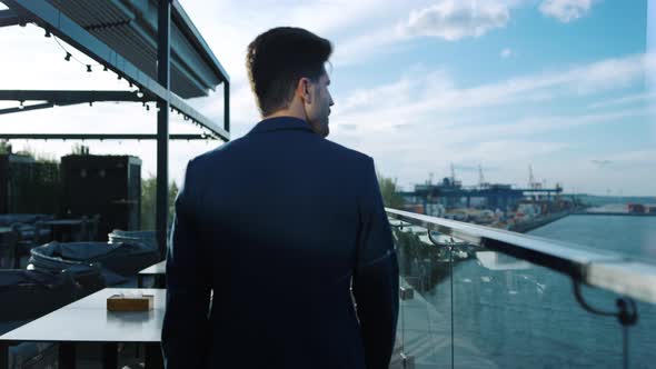 Confident Man Walking Terrace Closeup