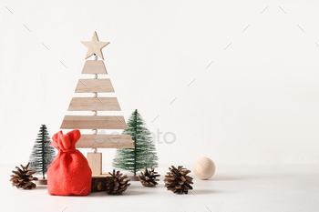 g and pine cones on white background. DIY. Concept eco Xmas holiday. Zero waste. Festive greeting card.