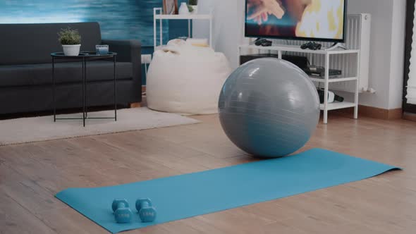 Empty Living Room with Equipment Used for Physical Exercise