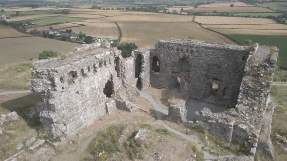 Ruins Of Medieval Castle In Rural Ireland (Rock of Dunamase) - aerial pullback