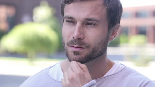 Pensive Serious Man Standing Outside Office