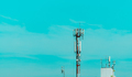 Telecommunication tower with blue sky. Antenna on blue sky. Radio and satellite pole. Communication - PhotoDune Item for Sale