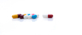 Antibiotic capsule pills on white background. Prescription drugs. Colorful capsule pills. Antibiotic - PhotoDune Item for Sale