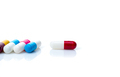 Antibiotic capsule pills on white background. Antibiotic drug resistance. Pharmacy banner. - PhotoDune Item for Sale