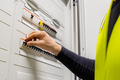 Close-up of male Technician Checking Electric Fuse Board In Server Room - PhotoDune Item for Sale
