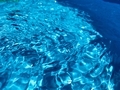 Blue water ripples inside of a pool  - PhotoDune Item for Sale