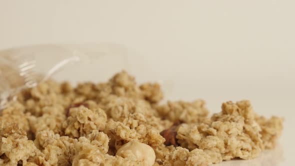 Healthy muesli with  hazelnuts shallow DOF 4K 2160p 30fps UltraHD footage - Dehydrated  crunchy cere