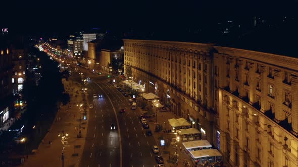 Aerial Top View of Illuminated City Street with Car Traffic