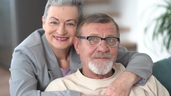 Close Portrait of Elderly Husband and Wife