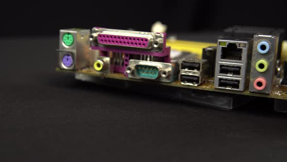 Side View of The Inputs of The Motherboard. Motherboard Pc Base Part. a Lot of Different Chips. View