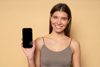 mockup phone screen recommending to download fitness app for everyday physical activity and workout tutorial, isolated on brown background