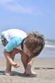 Small Boy Picking Up Shells - PhotoDune Item for Sale