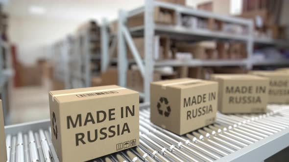 Cardboard Boxes with MADE IN RUSSIA Text on Conveyor