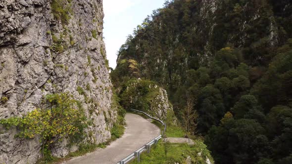 Aerial view from a drone on a road in the mountains.