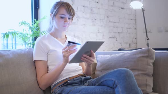 Online Shopping on Tablet PC By Sitting Woman