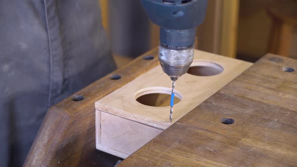 Male Works with Steel Drill alt