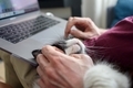 Man working on laptop with his cat - PhotoDune Item for Sale