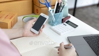 details and addresses on the Clipboard in order to prepare for shipping according to the information, New kind of business for young, Sell online.