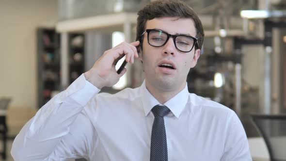 Businessman Talking on Phone