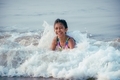 Young girl child enjoying summer time in water at the beach - PhotoDune Item for Sale