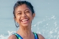 Close up outdoor portrait of a happy girl child playing in water. - PhotoDune Item for Sale