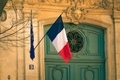 French flag hanging outside a beautifully ornate building - PhotoDune Item for Sale