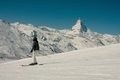 A skier in the Swiss alps with the iconic Matterhorn in the distance  - PhotoDune Item for Sale