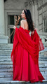 Full body in shot of a young girl in a long red dress with a wreath on her head - PhotoDune Item for Sale