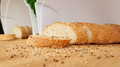 sliced ​​multi-cereal baguette in a bread box - PhotoDune Item for Sale