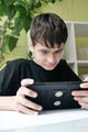 Gen-z and trends Teenager boy using tablet  - PhotoDune Item for Sale