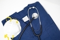 Medical scrubs a stethoscope and a N95 mask - PhotoDune Item for Sale