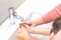 Mom helping washing hands of her kid - PhotoDune Item for Sale