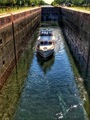 A boat in a lock  - PhotoDune Item for Sale
