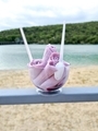 view of fried ice cream in a glass on the background of the sea and the beach - PhotoDune Item for Sale
