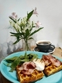 view of plate with potato waffles with bacon coffee and poached egg - PhotoDune Item for Sale
