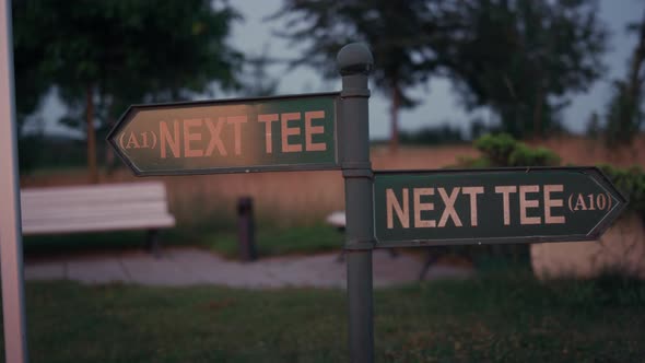 Golfing Sign Show Information Text at Sunset Nature Green Field Park Outdoors