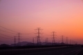 high-voltage electricity poles Tower - power station - distribute Electric energy , sunset - PhotoDune Item for Sale