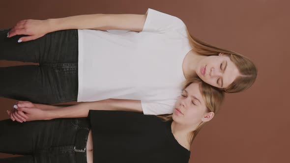 Vertical Portrait of Identical Girls