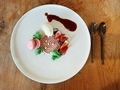 Elegant strawberry soufflé desert with ice-cream, macaroon, fresh berries and red berry sauce. - PhotoDune Item for Sale