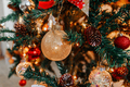 golden ball on the Christmas tree - PhotoDune Item for Sale