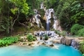 Kuang Si waterfalls with beatiful mint blue waters, Luang Prabang, Laos. - PhotoDune Item for Sale