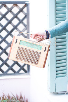 holds an old retro radio receiver
⚡️nominated⚡️