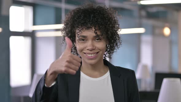 Portrait of Successful African Businesswoman Showing Thumbs Up