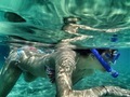 Woman snorkeling in the ocean  - PhotoDune Item for Sale
