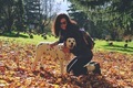 Eomen wkth happy dalmatian dog, autumn day - PhotoDune Item for Sale