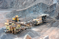 stone crusher in a surface mine. Open pit mine. Quarry - PhotoDune Item for Sale
