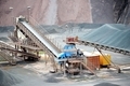stone crusher in a quarry mine of porphyry rocks. - PhotoDune Item for Sale