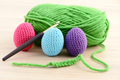 crocheting easter eggs in green, pink, blue and purple - PhotoDune Item for Sale